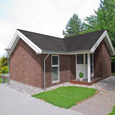 Фaсадная плитка Hauberk коллекция Кирпич цвет Обожженый на фасаде дома фото